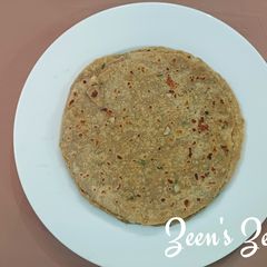 A picture of Bajra and Wheat Chapatis with Spring Onions.