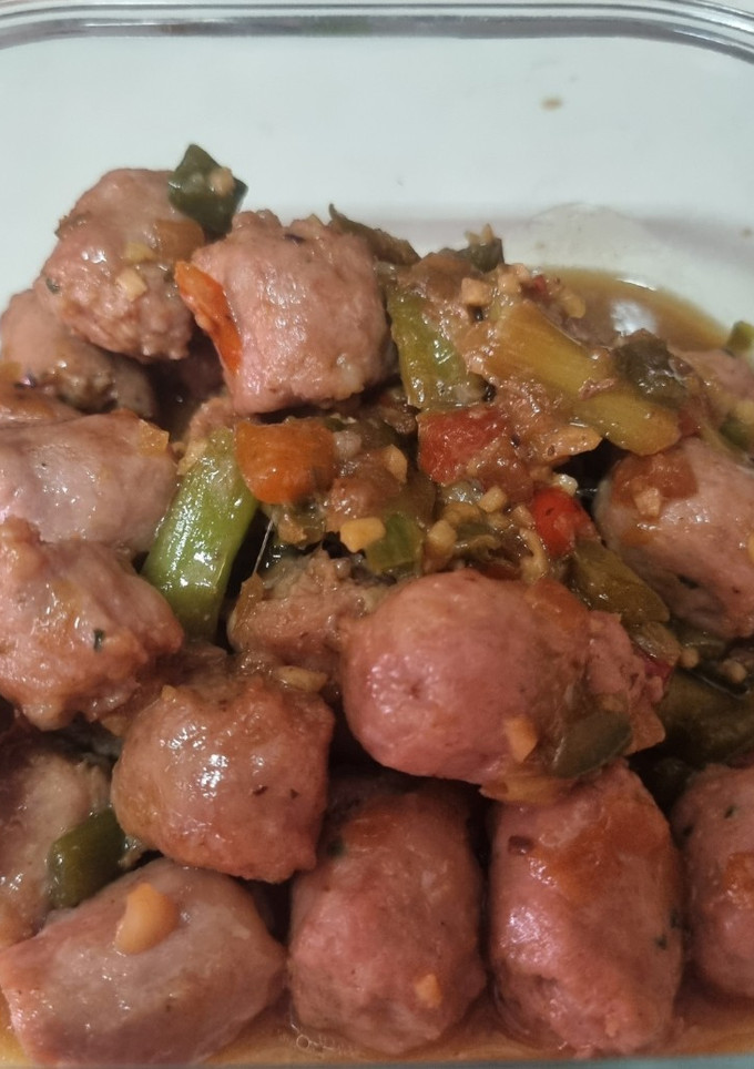 Una foto de Taquitos de salchichas frescas en salsa