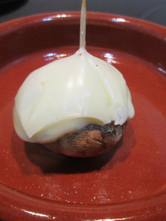 Una foto de Pincho de Champiñón con jamón y queso