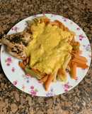 Fideos con salsa huancaína y pollo al horno