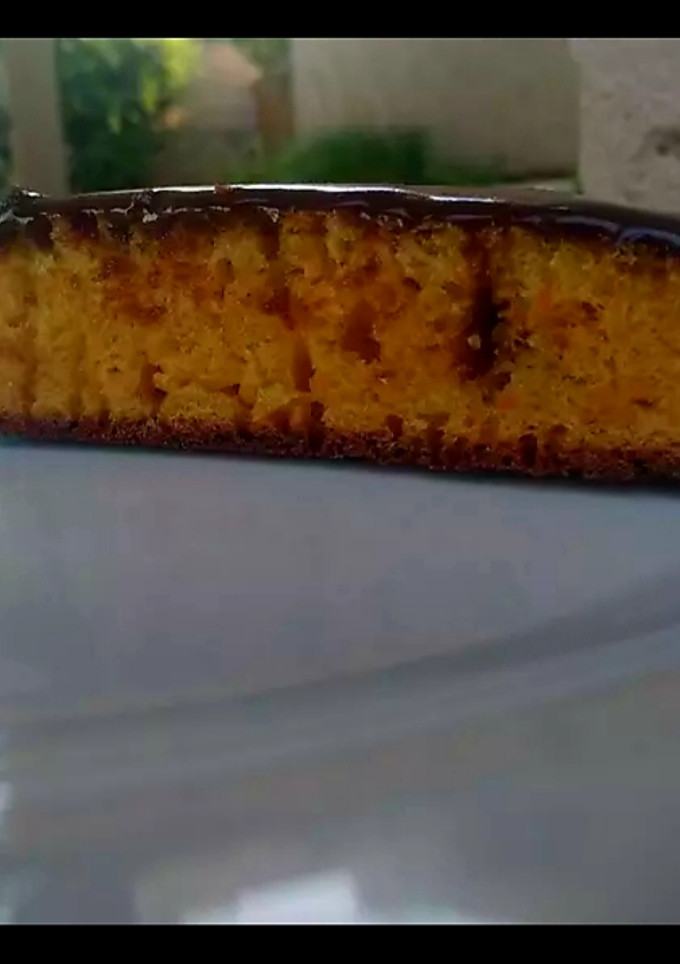 Una foto de Torta de zanahoria con cobertura de chocolate 🍮❣️