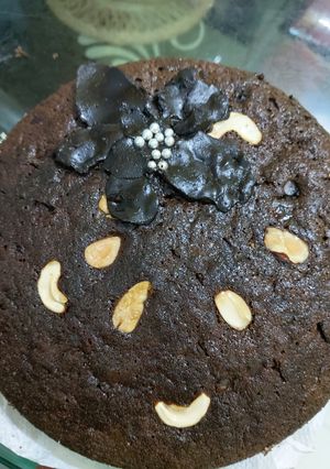 চকোলেট কেক উইথ চকোলেট ফ্লাওয়ার (chocolate cake with chocolate flower recipe in Bengali) রেসিপির প্রধান ছবি