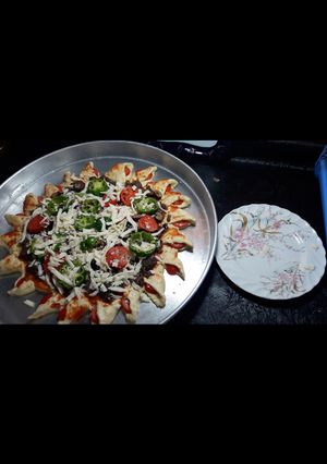 صورة لوصفة غيرى من شكل البيتزا وخليكى متميزه