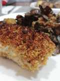 Merluza con costra y verduras al horno