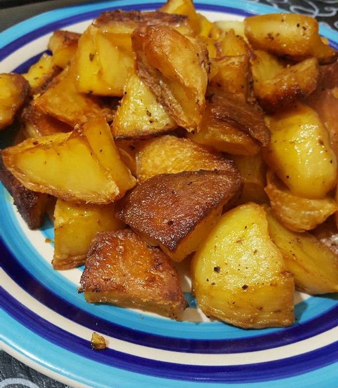 Una foto de Papas al horno