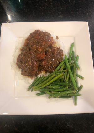 A picture of Smothered chicken or pork chops (shown with pork chops) Amethyst spin.