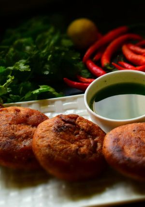 A picture of Deep Fried Kachoris Stuffed With Spicy Gram Flour Mixture.