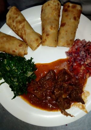 A picture of Chapati with fried kales.