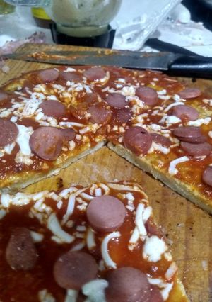 Una foto de Pizza de pollo sin harina