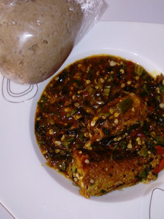 A picture of Wheat swallow with fresh okro and croker fish soup.