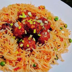 Schezwan Fried Rice With Manchurian A picture of Schezwan Fried Rice With Manchurian.