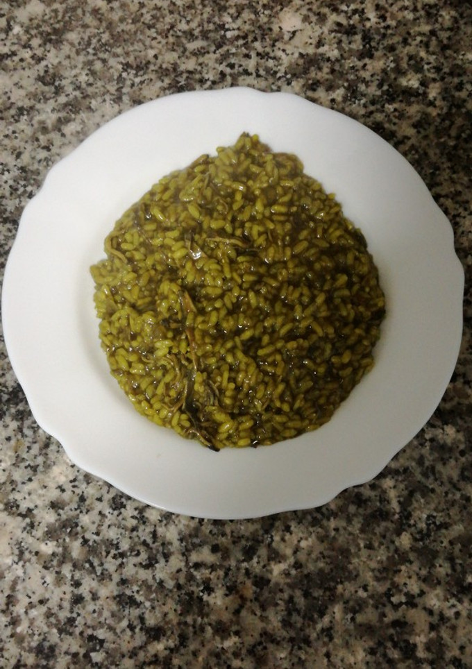 Una foto de Arroz con calamares en su tinta en Thermomix