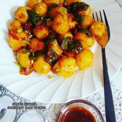 A picture of Schezwan Potatoes.