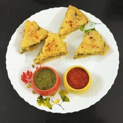 A picture of Layered Corn Stuffed Dhokla : A Fun Sandwich Twist.