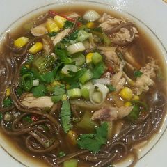 A picture of Chinese style chicken noodle soup.