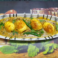 A picture of Reshmi Egg Malai.