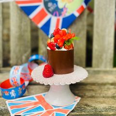 A picture of A Pudding for HM Queen, Eton Mess in a handmade Chocolate Cup.