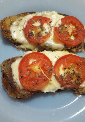 Una foto de Milanesas de berenjena a la napolitana