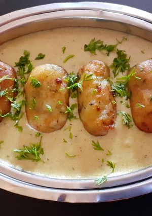 A picture of Khoya Paneer Kofta in Creamy Khoya Gravy.