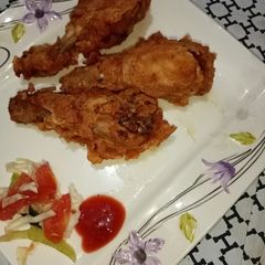 A picture of Crispy fried chicken leg piece.