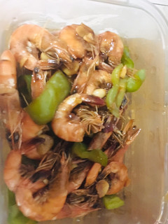 A picture of Sauted shrimp with bell pepper.