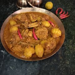A picture of Chicken masala curry.