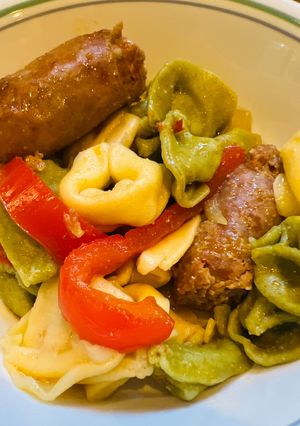 A picture of Italian Sausage in White Wine Sauce.