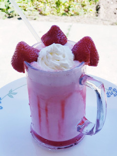 A picture of Rose badam strawberry shake.