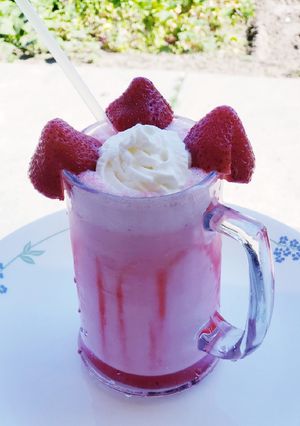 A picture of Rose badam strawberry shake.