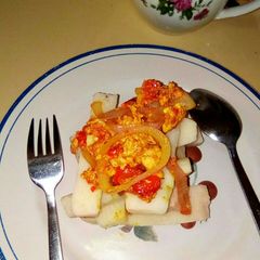 A picture of Yam with egg sauce.