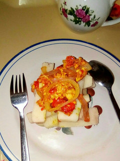 A picture of Yam with egg sauce.