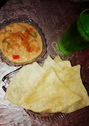 A picture of 'Dahi Chana Chaat with Ticon Puri' yan'.