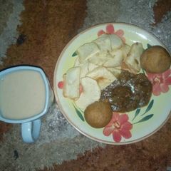 A picture of Yam and beans cake with pepper meat and kunnu tsmiya.