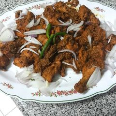 A picture of Tandoori chicken kebabs without oven.