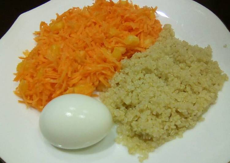 Carrot salad, boiled egg and boiled rice