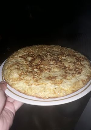 Una foto de Tortilla de papa y pollo