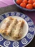 Canelones de carnes variadas, con bechamel y queso grana padano