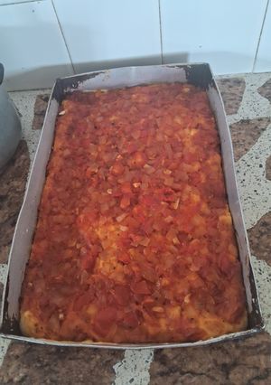 Una foto de Pizza clásica con mucho tomates🍅🍅🍕