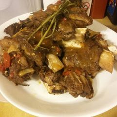 A picture of Beef Ribs in an Electric Pressure Cooker.