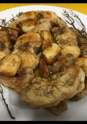 Una foto de Conejo al ajillo