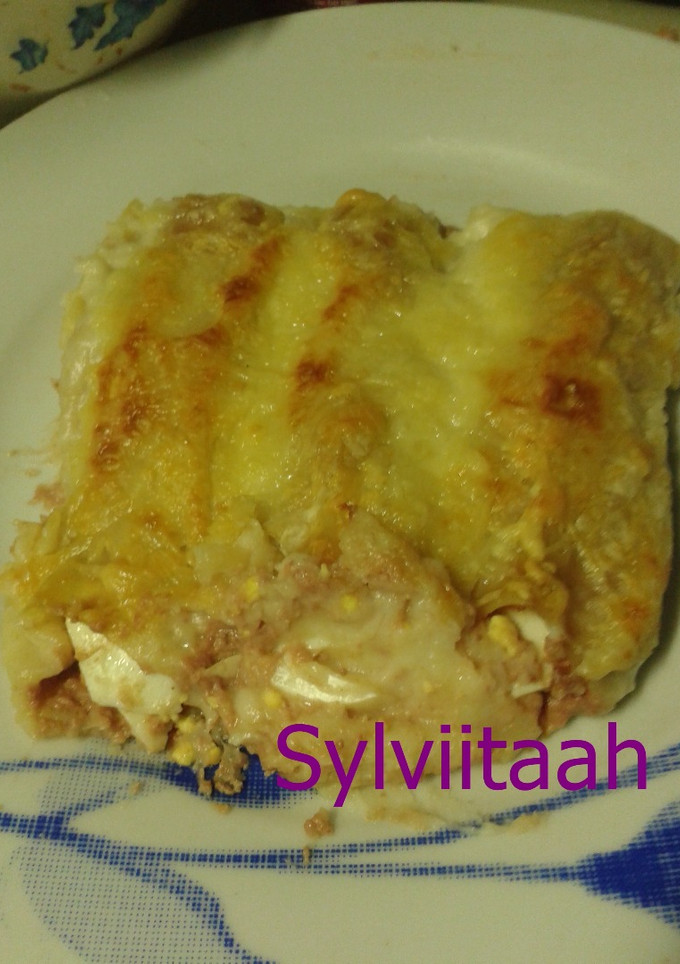 Una foto de Canelones de paté y huevo duro