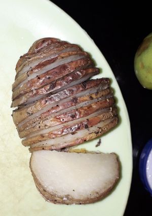 Una foto de Papas hasselback