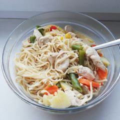 A picture of Tom kha kai with egg noodles.