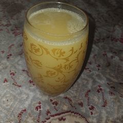 A picture of Paineapple orange and mint leave juice.