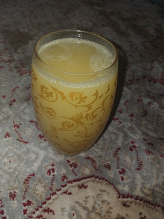 A picture of Paineapple orange and mint leave juice.