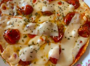 Foto de Pizza wrap com tomate cherry confitado