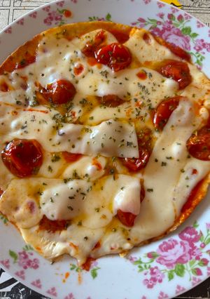 Foto de Pizza wrap com tomate cherry confitado