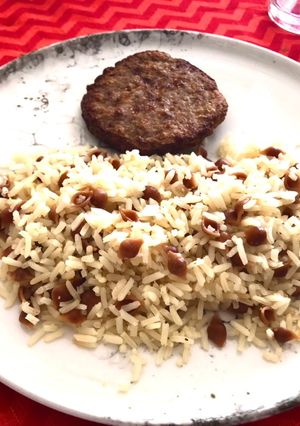 Una foto de Arroz con caracolitos tostados