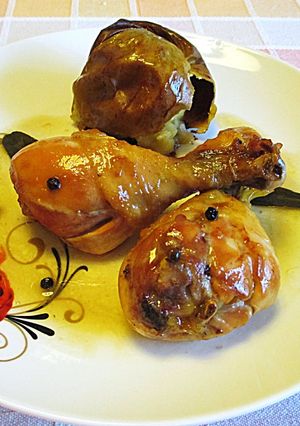 Foto principal de Jamoncitos de pollo fácil con manzanas a la sidra al horno