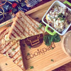 A picture of Grilled chicken and egg sandwich 🥪.
